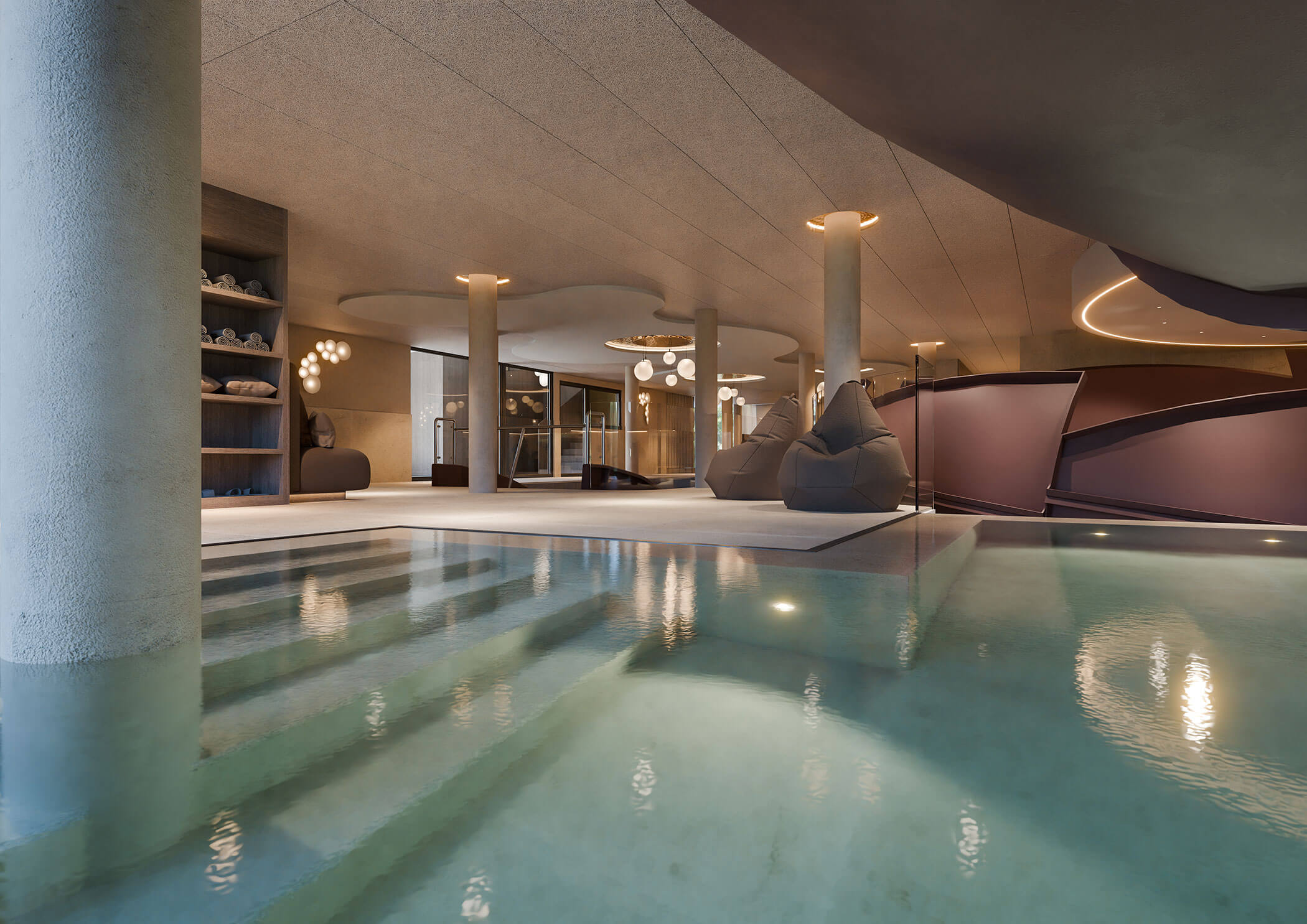 Moderner Hallenbadbereich mit Stufen, Liegestühlen, gedämpfter Beleuchtung und Regalen mit aufgerollten Handtüchern. - Majestic Resorts (Relaunch)