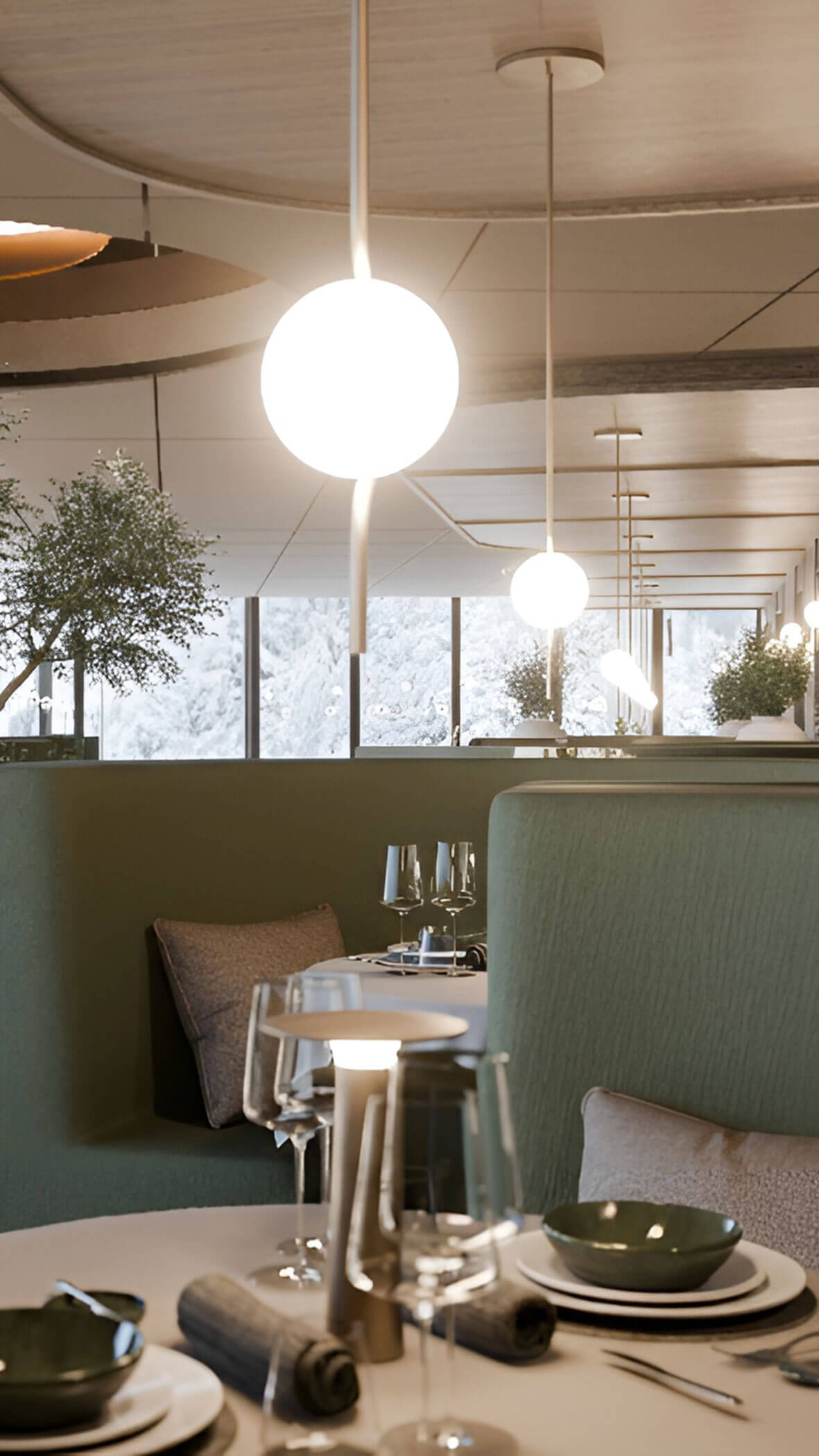 Modernes Restaurantinterieur mit grünen Ständen, runden, leuchtenden Pendelleuchten und großen Fenstern im Hintergrund. - Majestic Resorts (Relaunch)